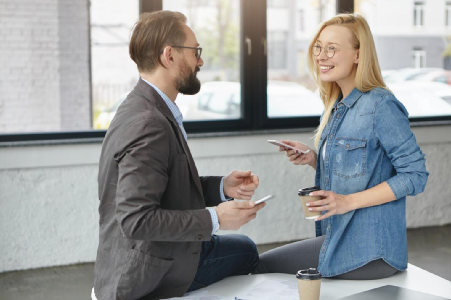 Group discussion session with students analyzing economic reports