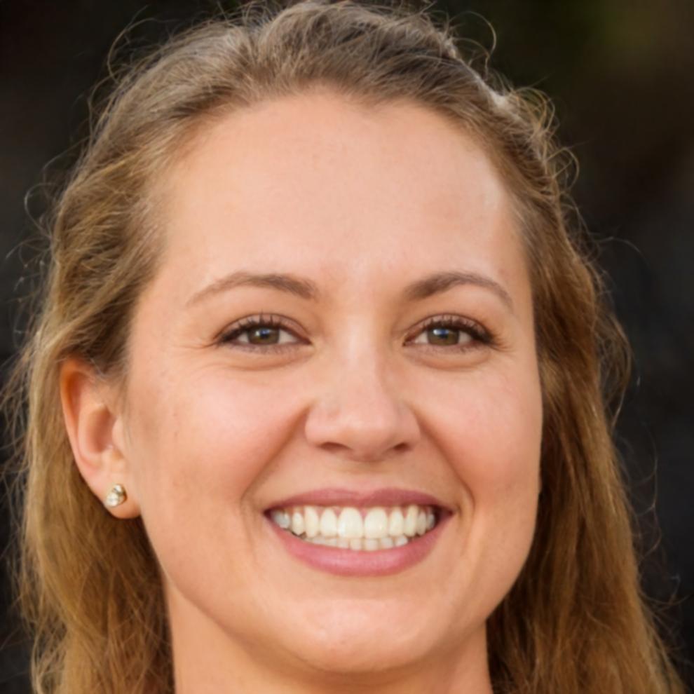 Professional woman reviewing financial documents in bright office space